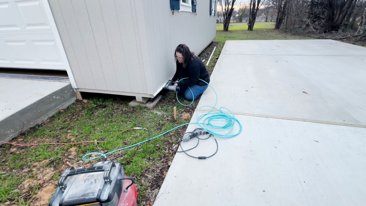 Installing ledger board as transition between shed siding and skirting