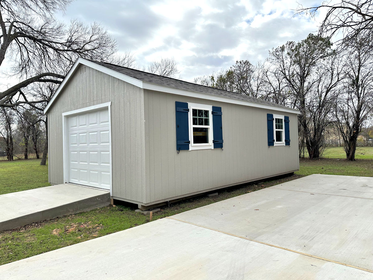 Progress on my backyard shed workshop makeover -- DIY board and batten shutters installed