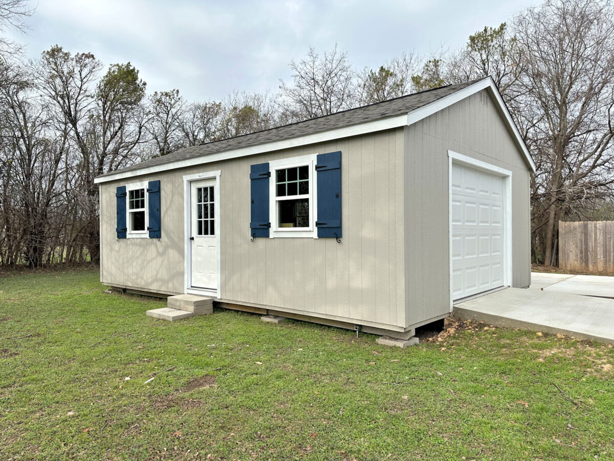 Progress on my backyard shed workshop makeover -- DIY board and batten shutters installed