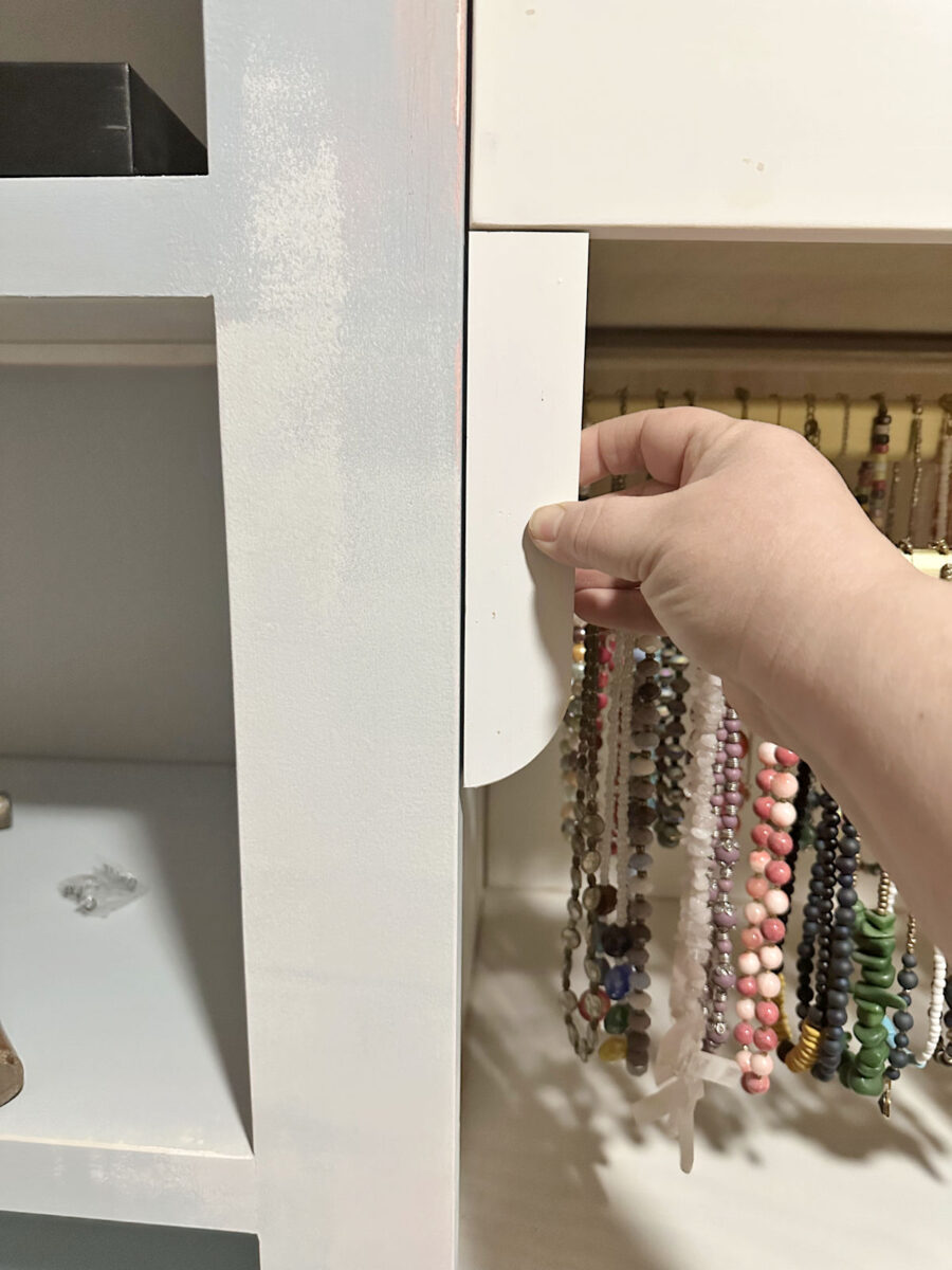Adding final details to DIY walk-in closet